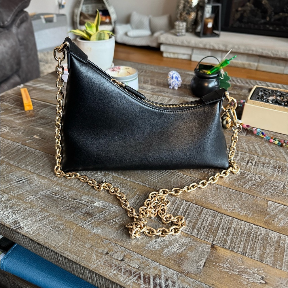 Elegant Black and Gold Crescent Shoulder Bag